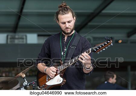 Stock Image - The Swiss music trio Forlorn Elm with David Friedli at the Gitrarre, Johanna Pärli on bass and Luca Weber on drums, live at the 25th Blue Balls Festival in Lucerne, Switzerland, Europe. Fotosearch