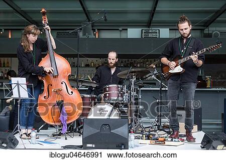 The Swiss music trio Forlorn Elm with David Friedli at the Gitrarre, Johanna Pärli on bass and Luca Weber on drums, live at the 25th Blue Balls Festival in Lucerne, Switzerland, Europe View Large Photo Image Stock Image - The Swiss music trio Forlorn Elm with David Friedli at the Gitrarre, Johanna Pärli on bass and Luca Weber on drums, live at the 25th Blue Balls Festival in Lucerne, Switzerland, Europe. Fotosearch