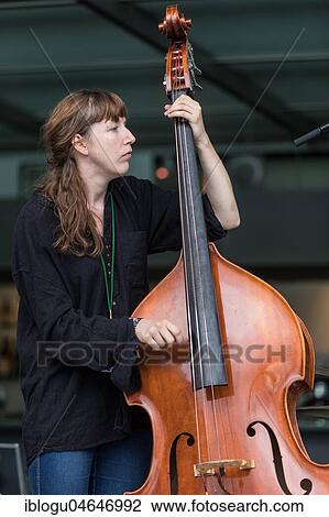 The Swiss music trio Forlorn Elm with David Friedli at the Gitrarre, Johanna Pärli on bass and Luca Weber on drums, live at the 25th Blue Balls Festival in Lucerne, Switzerland, Europe View Large Photo Image Stock Image - The Swiss music trio Forlorn Elm with David Friedli at the Gitrarre, Johanna Pärli on bass and Luca Weber on drums, live at the 25th Blue Balls Festival in Lucerne, Switzerland, Europe. Fotosearch