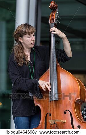 The Swiss music trio Forlorn Elm with David Friedli at the Gitrarre, Johanna Pärli on bass and Luca Weber on drums, live at the 25th Blue Balls Festival in Lucerne, Switzerland, Europe View Large Photo Image Stock Photo - The Swiss music trio Forlorn Elm with David Friedli at the Gitrarre, Johanna Pärli on bass and Luca Weber on drums, live at the 25th Blue Balls Festival in Lucerne, Switzerland, Europe. Fotosearch