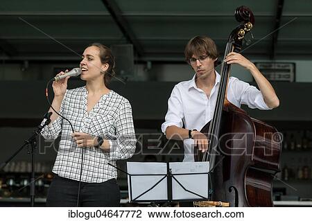The Swiss musician duo Duo Centrepiece with Adeline Hasler, vocals and Jonas Hoenig, bass live at the 25th Blue Balls Festival in Lucerne, Switzerland, Europe View Large Photo Image Stock Image - The Swiss musician duo Duo Centrepiece with Adeline Hasler, vocals and Jonas Hoenig, bass live at the 25th Blue Balls Festival in Lucerne, Switzerland, Europe. Fotosearch