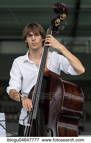 The Swiss musician duo Duo Centrepiece with Adeline Hasler, vocals and Jonas Hoenig, bass live at the 25th Blue Balls Festival in Lucerne, Switzerland, Europe View Large Photo Image Stock Photo - The Swiss musician duo Duo Centrepiece with Adeline Hasler, vocals and Jonas Hoenig, bass live at the 25th Blue Balls Festival in Lucerne, Switzerland, Europe. Fotosearch
