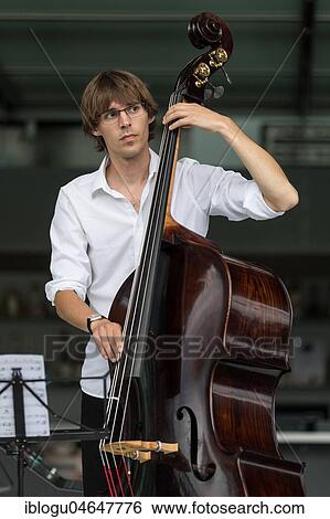 The Swiss musician duo Duo Centrepiece with Adeline Hasler, vocals and Jonas Hoenig, bass live at the 25th Blue Balls Festival in Lucerne, Switzerland, Europe View Large Photo Image Stock Photograph - The Swiss musician duo Duo Centrepiece with Adeline Hasler, vocals and Jonas Hoenig, bass live at the 25th Blue Balls Festival in Lucerne, Switzerland, Europe. Fotosearch