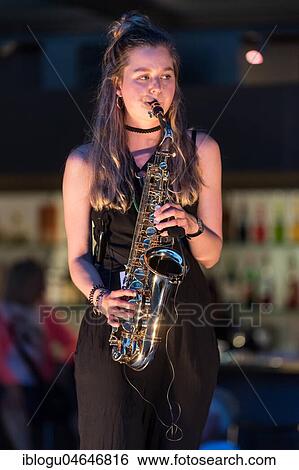 The Swiss musician duo Sarda with Sarah Belz, saxophone and David Friedli, guitar live at the 25th Blue Balls Festival in Lucerne, Switzerland, Europe View Large Photo Image Stock Photograph - The Swiss musician duo Sarda with Sarah Belz, saxophone and David Friedli, guitar live at the 25th Blue Balls Festival in Lucerne, Switzerland, Europe. Fotosearch