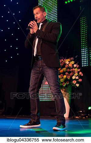 The Swiss pop singer and presenter Leonard live at the 16th Schlager Nacht in Lucerne, Switzerland, Europe View Large Photo Image Stock Photography - The Swiss pop singer and presenter Leonard live at the 16th Schlager Nacht in Lucerne, Switzerland, Europe. Fotosearch