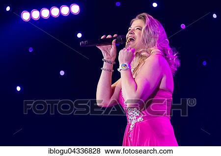 The Swiss Schlager and folk music singer Monique live at the 16th Schlager Nacht in Lucerne, Switzerland, Europe View Large Photo Image Stock Photo - The Swiss Schlager and folk music singer Monique live at the 16th Schlager Nacht in Lucerne, Switzerland, Europe. Fotosearch