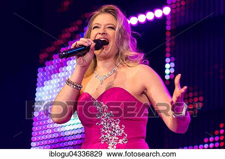 Stock Photo - The Swiss Schlager and folk music singer Monique live at the 16th Schlager Nacht in Lucerne, Switzerland, Europe. Fotosearch