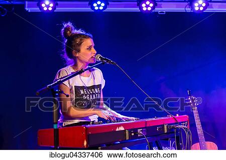Stock Photograph - The Swiss singer and songwriter Lina Button live at the Schüür Lucerne, Switzerland, Europe. Fotosearch