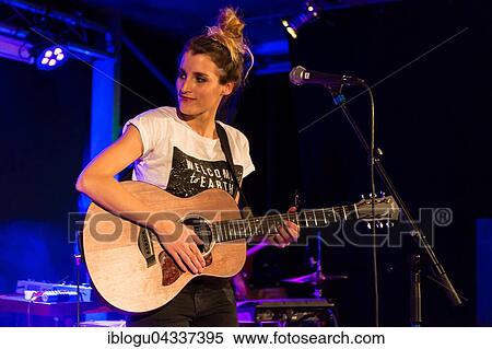 The Swiss singer and songwriter Lina Button live at the Schüür Lucerne, Switzerland, Europe View Large Photo Image Stock Photography - The Swiss singer and songwriter Lina Button live at the Schüür Lucerne, Switzerland, Europe. Fotosearch