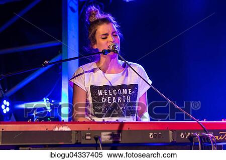 The Swiss singer and songwriter Lina Button live at the Schüür Lucerne, Switzerland, Europe View Large Photo Image Stock Photography - The Swiss singer and songwriter Lina Button live at the Schüür Lucerne, Switzerland, Europe. Fotosearch