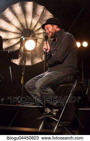 The Swiss singer and songwriter Lukas Linder alias Henrik Belden with band at the record baptism live in the Schüür Lucerne, Switzerland, Europe View Large Photo Image Stock Image - The Swiss singer and songwriter Lukas Linder alias Henrik Belden with band at the record baptism live in the Schüür Lucerne, Switzerland, Europe. Fotosearch