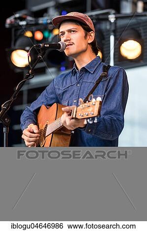 The Swiss singer and songwriter Simon Borer alias Long Tall Jefferson live at the 25th Blue Balls Festival in Lucerne, Switzerland, Europe View Large Photo Image Stock Photograph - The Swiss singer and songwriter Simon Borer alias Long Tall Jefferson live at the 25th Blue Balls Festival in Lucerne, Switzerland, Europe. Fotosearch