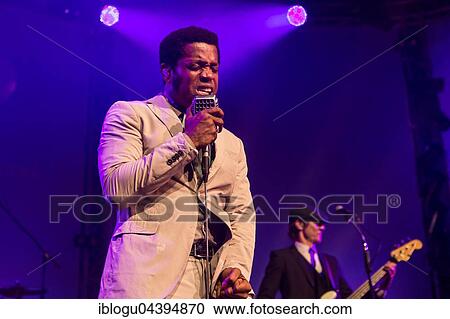The US-American Rhythm and Blues Band Vintage Trouble live at the Blue Balls Festival Lucerne, Switzerland Ty Taylor: Vocals Nalle Colt: Guitar Rick Barrio Dill: Bass Richard Danielson: Drums View Large Photo Image Stock Image - The US-American Rhythm and Blues Band Vintage Trouble live at the Blue Balls Festival Lucerne, Switzerland Ty Taylor: Vocals Nalle Colt: Guitar Rick Barrio Dill: Bass Richard Danielson: Drums. Fotosearch