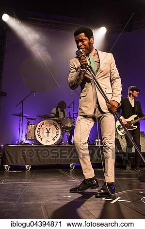 The US-American Rhythm and Blues Band Vintage Trouble live at the Blue Balls Festival Lucerne, Switzerland Ty Taylor: Vocals Nalle Colt: Guitar Rick Barrio Dill: Bass Richard Danielson: Drums View Large Photo Image Stock Image - The US-American Rhythm and Blues Band Vintage Trouble live at the Blue Balls Festival Lucerne, Switzerland Ty Taylor: Vocals Nalle Colt: Guitar Rick Barrio Dill: Bass Richard Danielson: Drums. Fotosearch