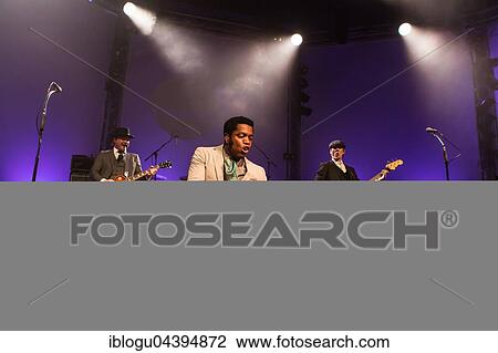 The US-American Rhythm and Blues Band Vintage Trouble live at the Blue Balls Festival Lucerne, Switzerland Ty Taylor: Vocals Nalle Colt: Guitar Rick Barrio Dill: Bass Richard Danielson: Drums View Large Photo Image Stock Image - The US-American Rhythm and Blues Band Vintage Trouble live at the Blue Balls Festival Lucerne, Switzerland Ty Taylor: Vocals Nalle Colt: Guitar Rick Barrio Dill: Bass Richard Danielson: Drums. Fotosearch