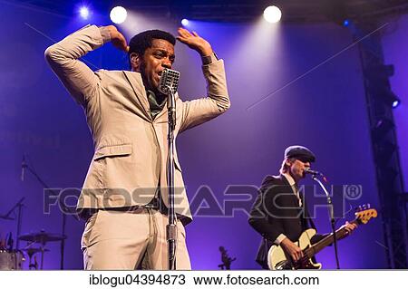 The US-American Rhythm and Blues Band Vintage Trouble live at the Blue Balls Festival Lucerne, Switzerland Ty Taylor: Vocals Nalle Colt: Guitar Rick Barrio Dill: Bass Richard Danielson: Drums View Large Photo Image Stock Image - The US-American Rhythm and Blues Band Vintage Trouble live at the Blue Balls Festival Lucerne, Switzerland Ty Taylor: Vocals Nalle Colt: Guitar Rick Barrio Dill: Bass Richard Danielson: Drums. Fotosearch