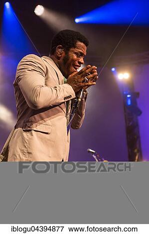 The US-American Rhythm and Blues Band Vintage Trouble live at the Blue Balls Festival Lucerne, Switzerland Ty Taylor: Vocals Nalle Colt: Guitar Rick Barrio Dill: Bass Richard Danielson: Drums View Large Photo Image Stock Photo - The US-American Rhythm and Blues Band Vintage Trouble live at the Blue Balls Festival Lucerne, Switzerland Ty Taylor: Vocals Nalle Colt: Guitar Rick Barrio Dill: Bass Richard Danielson: Drums. Fotosearch