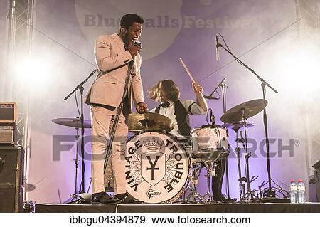 The US-American Rhythm and Blues Band Vintage Trouble live at the Blue Balls Festival Lucerne, Switzerland Ty Taylor: Vocals Nalle Colt: Guitar Rick Barrio Dill: Bass Richard Danielson: Drums View Large Photo Image Stock Photo - The US-American Rhythm and Blues Band Vintage Trouble live at the Blue Balls Festival Lucerne, Switzerland Ty Taylor: Vocals Nalle Colt: Guitar Rick Barrio Dill: Bass Richard Danielson: Drums. Fotosearch