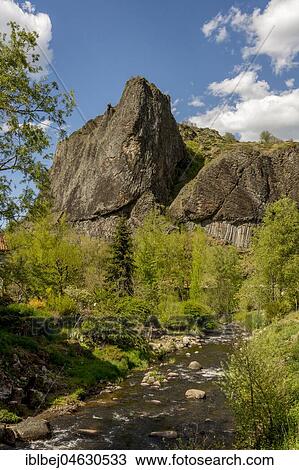 Stock Image - The volcanic basalt formation of Roche Serviere near Prades, Haute Loire departement, Auvergne, France, Europe. Fotosearch