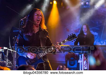 Stock Image - Thomas Youngblood, guitarist of the American melodic power metal band Kamelot live in the Schüür Lucerne, Switzerland, Europe. Fotosearch
