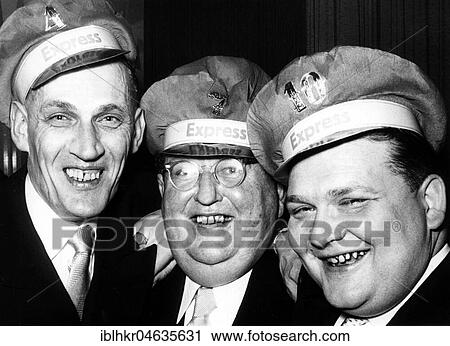 Stock Image - Three men laughing, 1950s, exact place unknown, Germany, Europe. Fotosearch