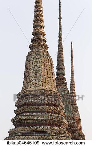 Three of the four Great Chedis of the Phra-Maha-Chedi-Si-Ratchakan Group, decorated with coloured tiles, Wat Pho, Buddhist temple complex, Rattanakosin, Bangkok, Thailand, Asia View Large Photo Image Stock Photo - Three of the four Great Chedis of the Phra-Maha-Chedi-Si-Ratchakan Group, decorated with coloured tiles, Wat Pho, Buddhist temple complex, Rattanakosin, Bangkok, Thailand, Asia. Fotosearch