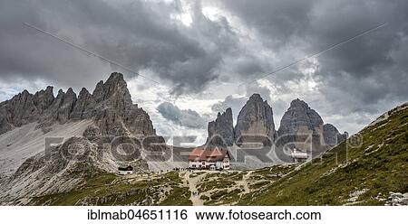 Stock Photograph - Three Peaks Cottage with Patternkofel and north walls of the Three Peaks, Sexten Dolomites, South Tyrol, Trentino-South Tyrol, Alto-Adige, Italy, Europe. Fotosearch