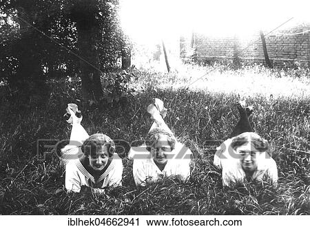 Stock Image - Three women in the meadow, 1930s, Germany, Europe. Fotosearch