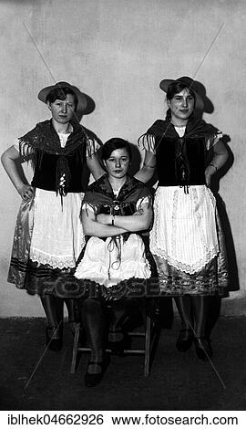 Stock Photograph - Three women in traditional traditional costume, 1940s, Germany, Europe. Fotosearch