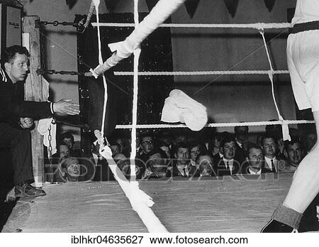 Throwing the towel while boxing, 1950s, exact location unknown, Germany, Europe View Large Photo Image Stock Photo - Throwing the towel while boxing, 1950s, exact location unknown, Germany, Europe. Fotosearch