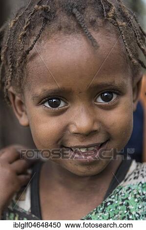 Stock Image - Toddler approx. 3 years, girl from Ari tribe, Omo region, Ethiopia, Africa. Fotosearch