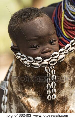 Toddler in goatskin, Karo tribe, Southern Nations Nationalities and Peoples' Region, Ethiopia, Africa View Large Photo Image Stock Image - Toddler in goatskin, Karo tribe, Southern Nations Nationalities and Peoples' Region, Ethiopia, Africa. Fotosearch