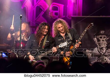 Stock Photography - Tony Castell, guitarist and Scott Leach, guitarist of the Swiss hard rock band Crystal Ball live in the Schüür Lucerne, Switzerland, Europe. Fotosearch