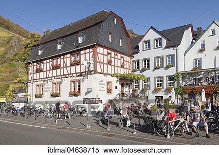 Tourists in front of the Cafe Restaurant Altes Zollhaus, Beilstein, Moselle, Rhineland-Palatinate, Germany, Europe View Large Photo Image Stock Photography - Tourists in front of the Cafe Restaurant Altes Zollhaus, Beilstein, Moselle, Rhineland-Palatinate, Germany, Europe. Fotosearch