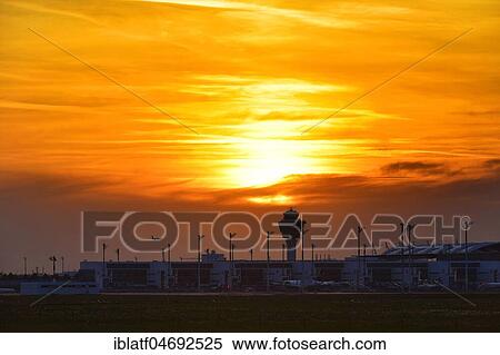 Stock Photography - Tower and Terminal 2 at sunset, Munich Airport, Upper Bavaria, Bavaria, Germany, Europe. Fotosearch