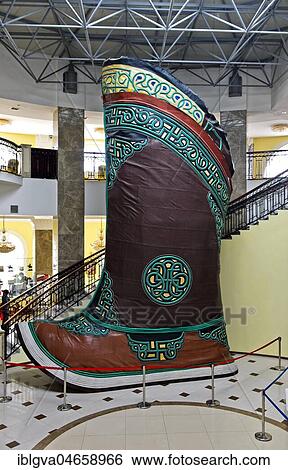 Stock Photograph - Traditional Mongolian boot, largest shoe in the world, in Genghis Khan Theme Park, Chinggis Khan Statue Complex, Tsonjin Boldog, Mongolia, Asia. Fotosearch