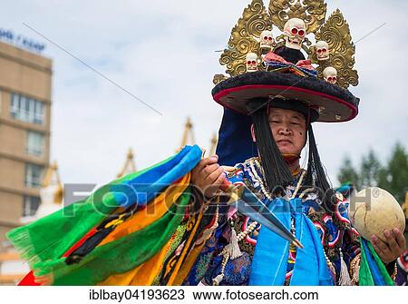 Stock Image - Traditional Tsam dance during a culture festival, Mongolia, Asia. Fotosearch