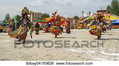 Stock Photograph - Traditional Tsam dance during a culture festival, Mongolia, Asia. Fotosearch