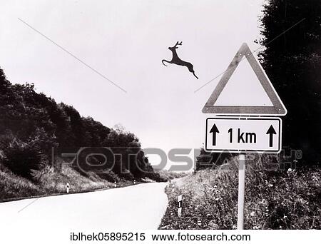 Stock Photography - Traffic sign, deer jumps out of sign, assembly, Lauda, Germany, Europe. Fotosearch