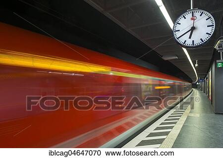 Stock Image - Train coming in at the platform, metropolitan station Taunusanlage, Westend, Frankfurt am Main, Hesse, Germany, Europe. Fotosearch