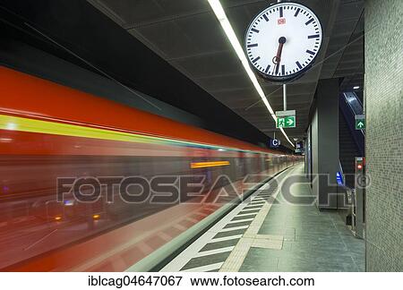 Stock Photo - Train coming in at the platform, metropolitan station Taunusanlage, Westend, Frankfurt am Main, Hesse, Germany, Europe. Fotosearch