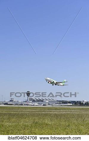 Stock Photo - Transavia, Boeing B 737-800, takeoff, Munich Airport, Germany, Europe. Fotosearch