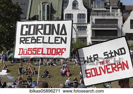 Stock Image - Transparent corona rebels, demonstration against corona rules on the Rhine meadows, Düsseldorf, North Rhine-Westphalia, Germany, Europe. Fotosearch