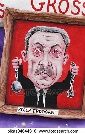 Stock Photo - Turkish president Recep Tayyip Erdogan holds chains, political caricature, motto caravan during Carnival Monday procession 2018, Düsseldorf, North Rhine-Westphalia, Germany, Europe. Fotosearch