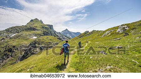 Two hikers on Schladminger Höhenweg, Schladminger Tauern, Schladming, Styria, Austria, Europe View Large Photo Image Stock Image - Two hikers on Schladminger Höhenweg, Schladminger Tauern, Schladming, Styria, Austria, Europe. Fotosearch
