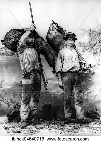 Stock Photo - Two men sell water, 1910s, exact place unknown, Portugal, Europe. Fotosearch