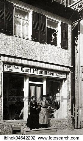 Two saleswomen in front of the fashion store Carl Pfundtner, 1910s, Germany, Europe View Large Photo Image Stock Image - Two saleswomen in front of the fashion store Carl Pfundtner, 1910s, Germany, Europe. Fotosearch