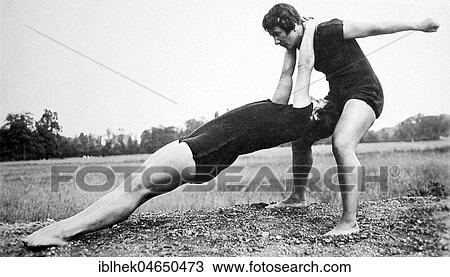 Two women doing gymnastics, 1920s, Germany, Europe View Large Photo Image Stock Image - Two women doing gymnastics, 1920s, Germany, Europe. Fotosearch