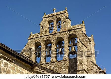 Stock Photo - Typical belle tower of the church in Chanaleilles on Via Podiensis, Camino de Santiago, Pilgrimage way, Haute-Loire department, Auvergne-Rhône-Alpes, France, Europe. Fotosearch