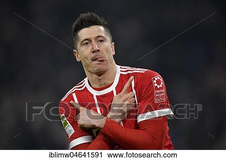 Typical celebration with crossed arms and tongue, Robert Lewandowski of FC Bayern Munich, Allianz Arena, Munich, Bavaria, Germany, Europe View Large Photo Image Stock Image - Typical celebration with crossed arms and tongue, Robert Lewandowski of FC Bayern Munich, Allianz Arena, Munich, Bavaria, Germany, Europe. Fotosearch